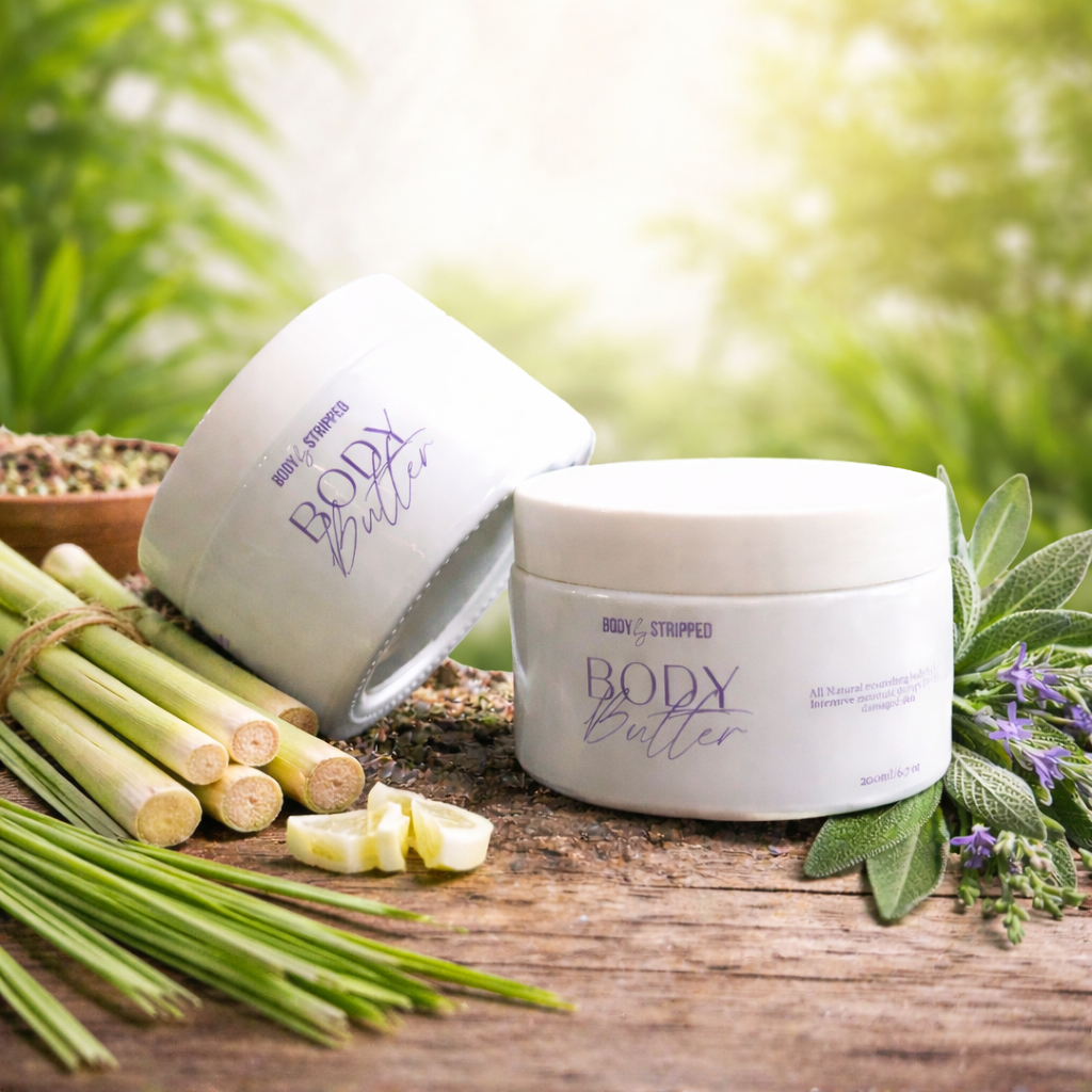 Two containers of body butter on a wooden surface for lemongrass and sage